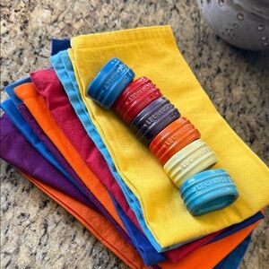 Le Creuset napkin holders and William Sonoma Napkins